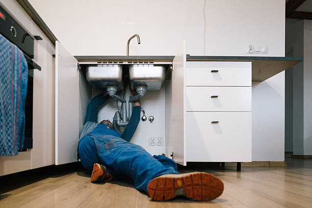 Professional Emergency Plumber technician working in Flushing, NY
